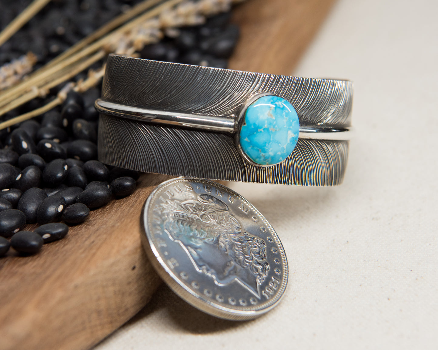 Kingman Turquoise Stamped Feather Cuff