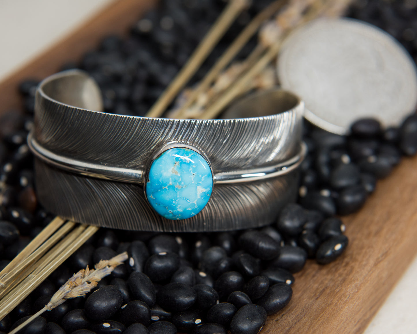 Kingman Turquoise Stamped Feather Cuff