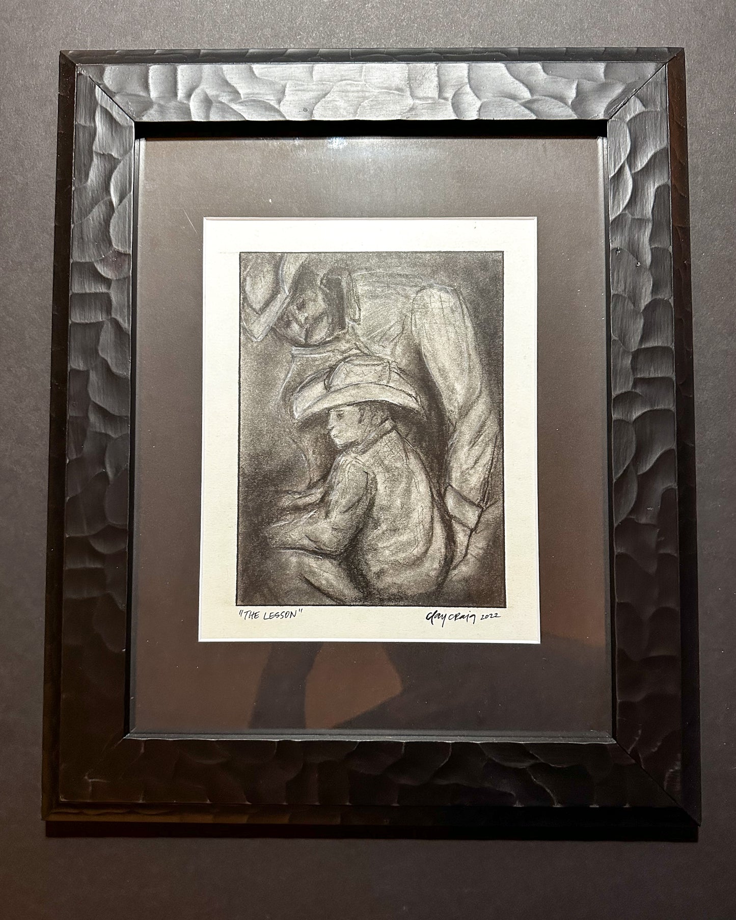 “The Lesson” framed charcoal
